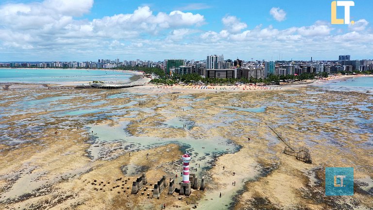 Habitación y Salón a 200mt playa Ponta Verde con 2 baños